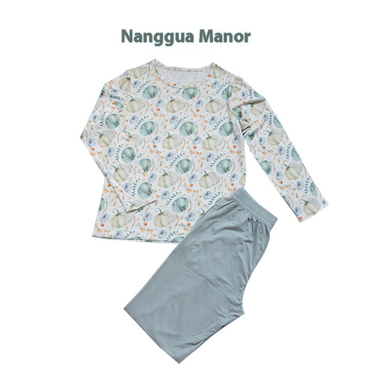 Bamboo cotton knitted parent-child pajama set with a pumpkin print long-sleeve top and solid light blue-grey pants. - Image 8