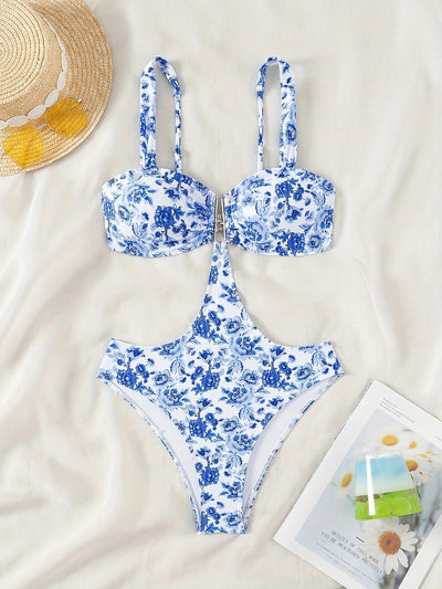 Blue and white floral one-piece swimsuit with a V-bar detail and side cut-outs, perfect for summer. - Image 16