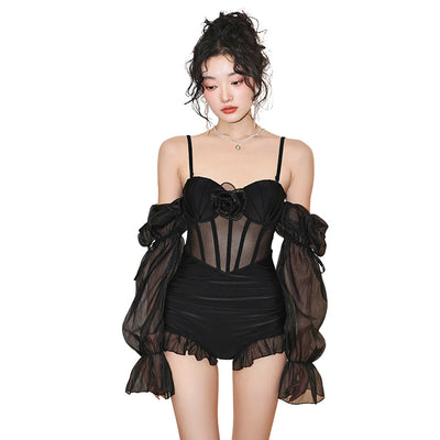 Black two-piece swimsuit with sheer lace puff sleeves, a sweetheart neckline, and a rose applique on the bust. - Image 5