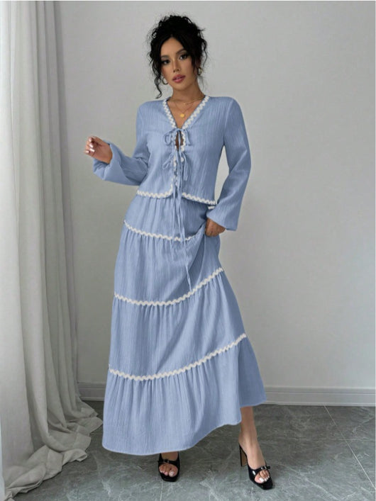 Conjunto Elegante con Blusa de Encaje y Falda Plisada con Mangas Farol - Image 10