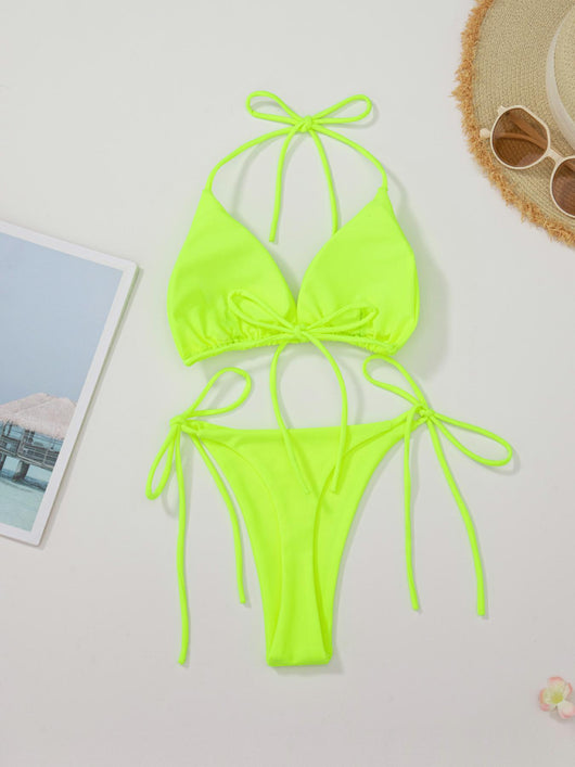 Red solid color two-piece bikini swimsuit with a halter tie-top and adjustable tie-side thong bottom. - Image 11