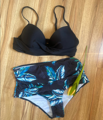 Woman wearing a bright yellow push-up bikini top and high-waisted bottoms with a green tropical leaf print. - Image 9