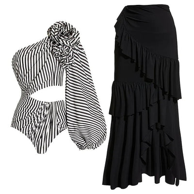 Black and white striped one-piece swimsuit with one-shoulder design, floral appliqué, balloon sleeve, and waist cut-outs. - Image 15
