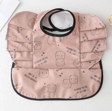 Babero Impermeable con Bolsillo Alas de Ángel para Bebé - Image 28