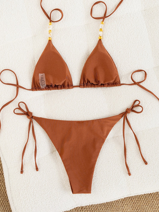 Solid brown two-piece bikini with triangle top and tie-side bottoms, featuring decorative beads on the top straps. - Image 15