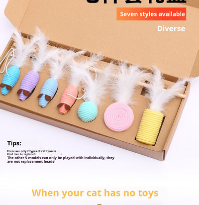7-piece cat toy gift set with mouse, feather wands, and string-wrapped toys in a brown cardboard box. - Image 16