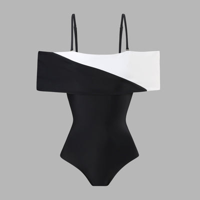 Black one-piece swimsuit with a deep V-neckline and white horizontal stitching detail across the plunge. - Image 28