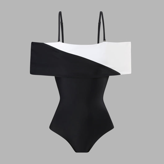 Black one-piece swimsuit with a deep V-neckline and white horizontal stitching detail across the plunge. - Image 28