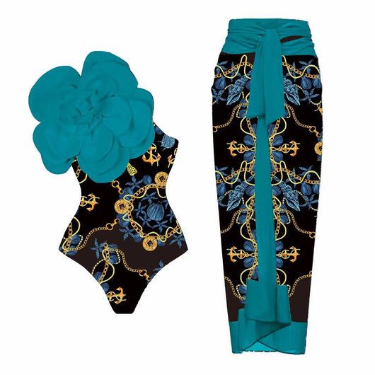 Women's one-piece swimsuit with a black, gold chain, and anchor pattern, featuring a large teal flower on one shoulder. - Image 8