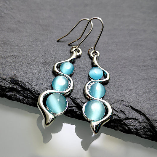 Aretes Ondulados Estilo Bohemio con Gema Ojo de Gato - Image 9