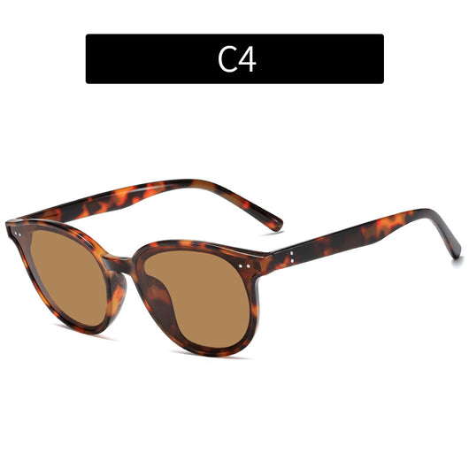 Jelly yellow frame sunglasses with green lenses, featuring a rounded cat-eye shape for UV protection and fashion. - Image 3