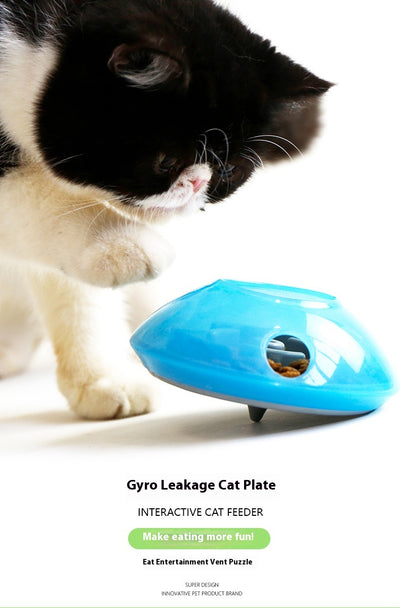 Green and white pet toy, a round food dispenser with multiple openings and a central spinning element for cats. - Image 14