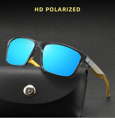 Black and blue polarized sports sunglasses with rectangular frames and blue mirrored lenses reflecting snowy mountains.
