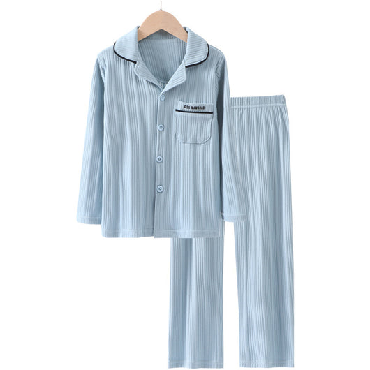 Beige ribbed cotton children's pajama set with long-sleeved lapel top and matching pants, featuring black trim. - Image 14