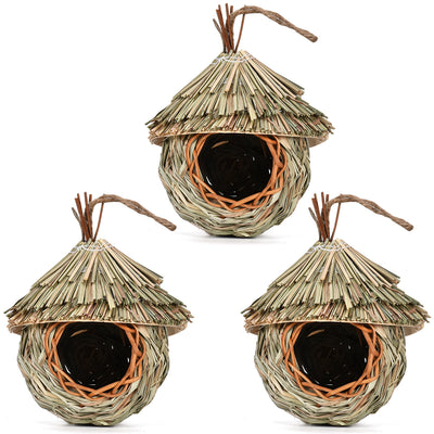 Handmade hanging bird nest crafted from natural grass and wicker, featuring a thatched roof and a round entrance. - Image 7