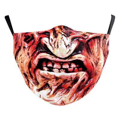 Green and yellow digital print Halloween dust mask with a grotesque, tree-like face design and black ear loops. - Image 32