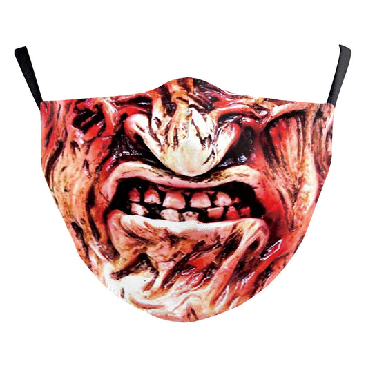 Green and yellow digital print Halloween dust mask with a grotesque, tree-like face design and black ear loops. - Image 32
