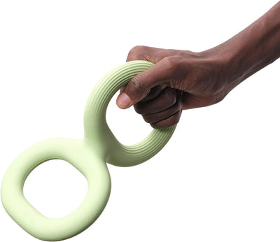 Light green rubber pet bite and pull toy shaped like a figure eight, with a ribbed texture on one end. - Image 17