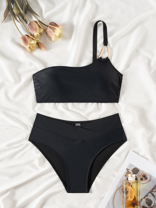 Black one-shoulder bikini with a gold-tone metal buckle detail and high-waisted bottoms with a V-front design. - Image 12