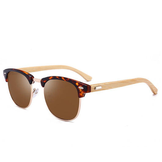 Clubmaster sunglasses with black upper frames, gold-tone metal lower rims, blue mirrored lenses, and light wood-look temples. - Image 10