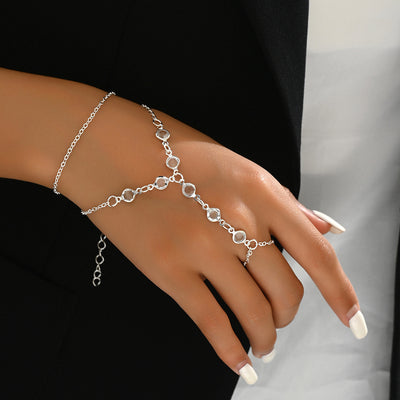 Gold-tone layered bracelet ring with clear crystal accents and a finger loop, featuring a lobster clasp closure. - Image 11