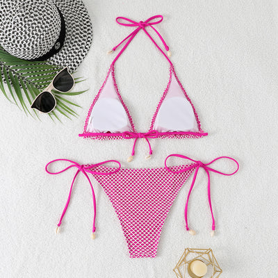 Blue and white mesh triangle bikini set with tie-side bottom and shell accents, displayed on a white beach towel. - Image 19
