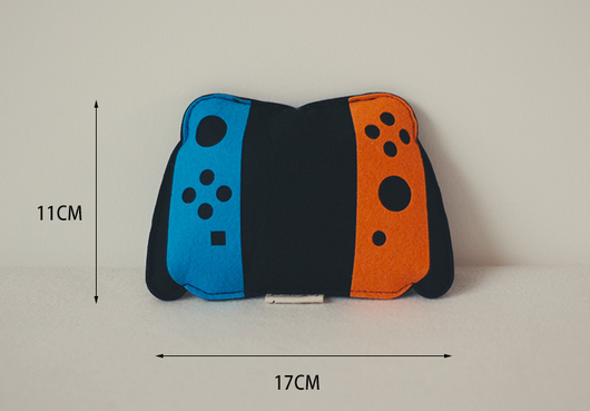 Light blue felt catnip toy shaped like a game controller with piano keys and a black string for hanging. - Image 10
