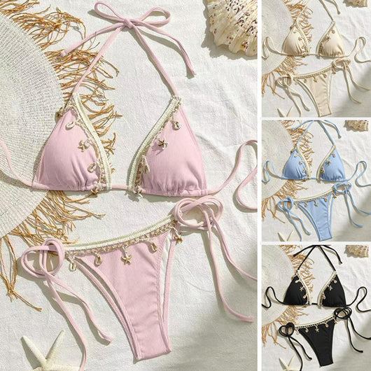 Light pink ribbed halterneck bikini with triangle cups and tie-side bottom, adorned with shell and starfish charms. - Image 2
