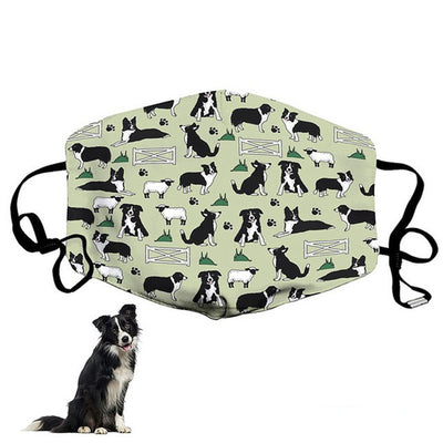 Light green face mask with a pattern of black and white Border Collies, sheep, fences, and paw prints. Features black adjustable ear loops. - Image 2