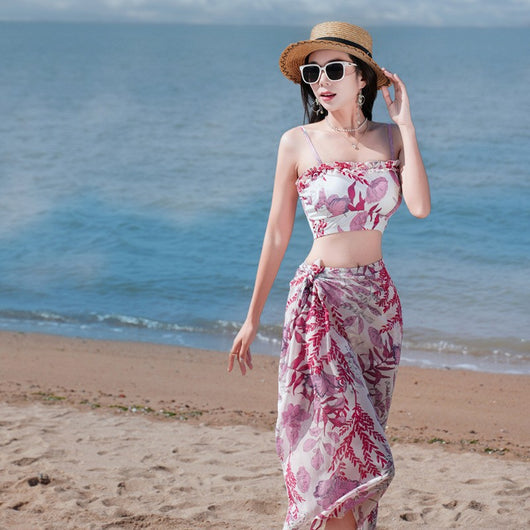 Women's light blue tropical leaf print three-piece swimsuit with short sleeve bikini top, bottoms, and sarong skirt. - Image 27