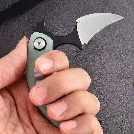 Cuchillo Plegable Portátil para Aventuras Outdoor - Image 11