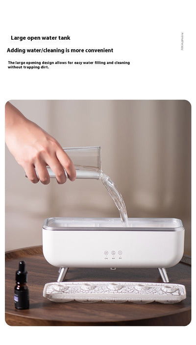 White rectangular ultrasonic humidifier with a textured top, silver legs, and control icons for mist, rotation, and light. - Image 12