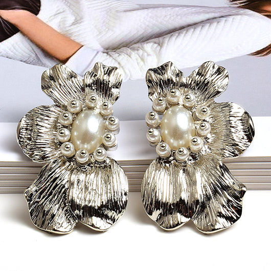 Aretes de Flores Exageradas con Metal Simétrico - Estilo Europeo y Americano - Image 9