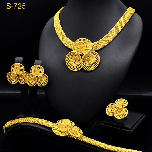 Gold-colored four-piece jewelry set with mesh texture: necklace, drop earrings, bracelet, and ring, all with knot design. - Image 2