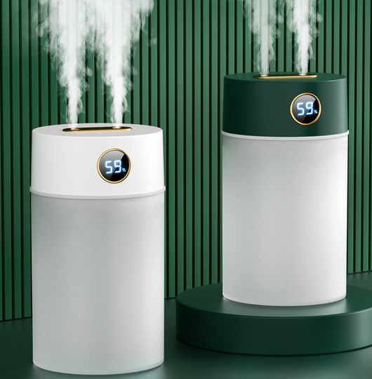 White cylindrical humidifier with a gold nozzle emitting mist, featuring a subtle bear emblem. Includes five aromatherapy oil bottles. - Image 20