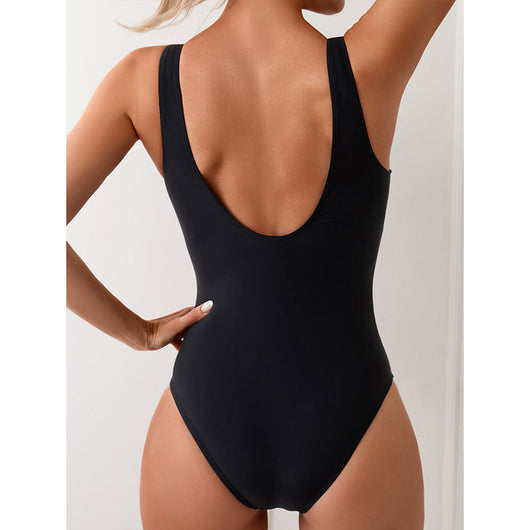Black one-piece swimsuit with vibrant pink diagonal stripes, featuring a scoop neck and tank straps. - Image 2