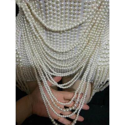 Conjunto Elegante Top Tubo Blanco con Perlas y Falda Ajustada - Image 13