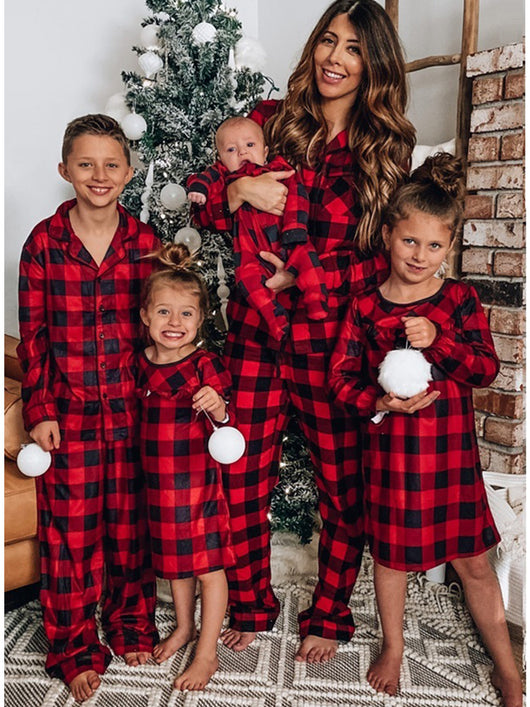 Red and black buffalo plaid family pajama sets, including adult tops and bottoms, kids' pajamas, and a baby romper. - Image 12