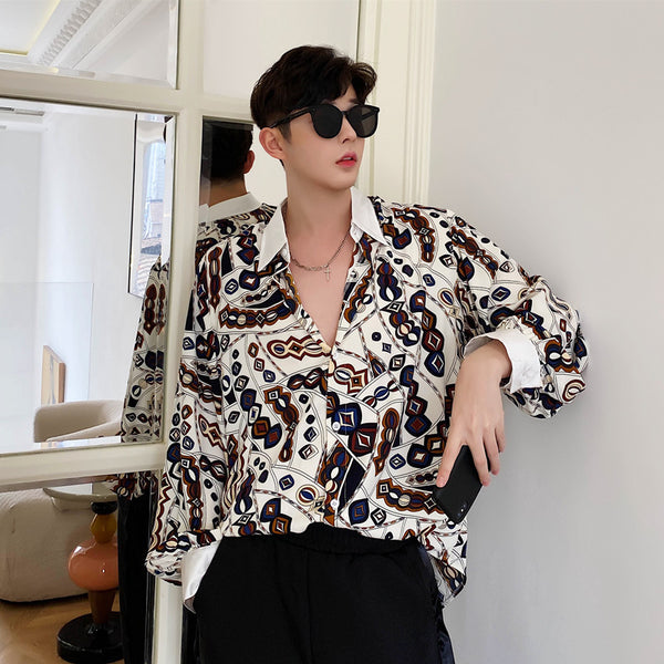 Blusa Floral Retro con Elegancia Contemporánea y Mangas Largas