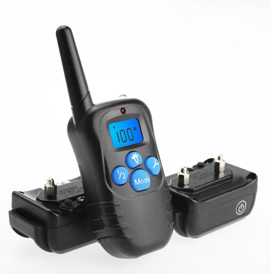Black remote control dog trainer with blue LCD screen, alongside one black and one orange training collar. - Image 6