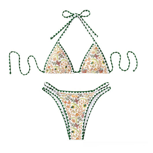 White halter bikini with green rickrack trim and a vibrant floral and bird print, featuring a triangle top and high-cut bottom. - Image 4