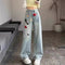 Calça Jeans Reta Cintura Alta com Bordados Feminina