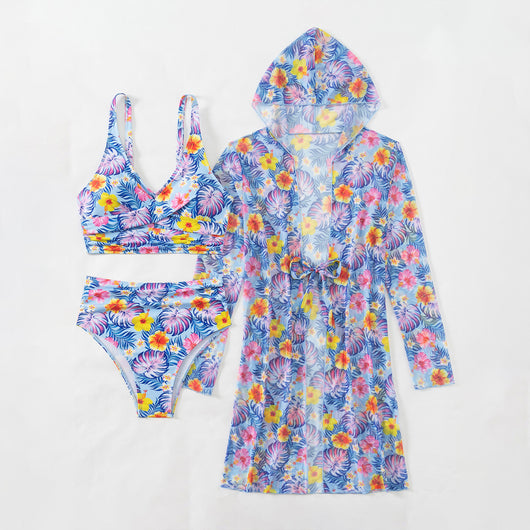 Woman in a red multicolor floral print three-piece swimsuit with high-waisted bikini and long-sleeve cover-up, straw hat, and sunglasses on a beach. - Image 32