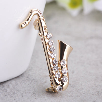 Broche de Saxofón con Diamantes - Joya Musical Elegante - Image 7
