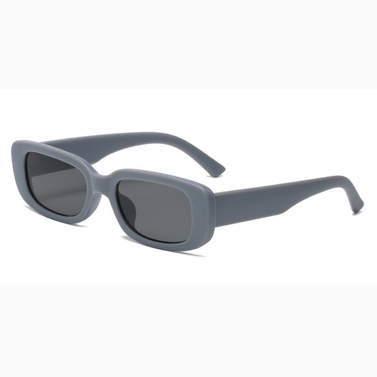 Rectangular tortoiseshell sunglasses with a small frame and dark gray lenses, angled on a white background. - Image 19