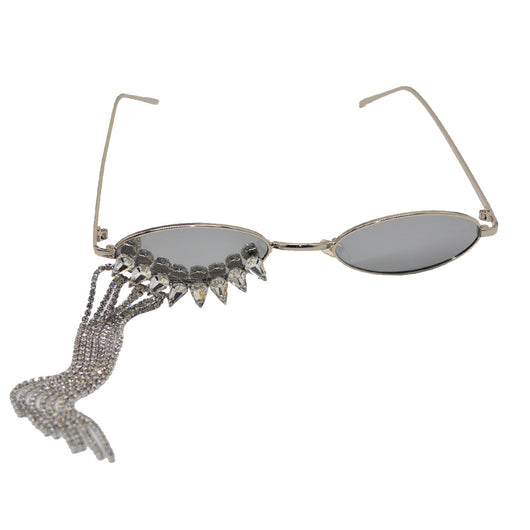 Silver oval-frame sunglasses with mirrored lenses and glamorous rhinestone tassels on one side, held by a gloved hand. - Image 5