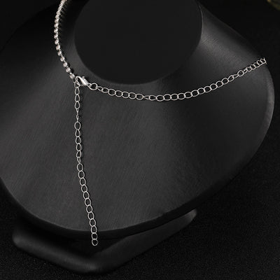 Elegant silver-tone necklace and matching drop earrings set with clear marquise and teardrop stones, displayed on a black bust. - Image 4