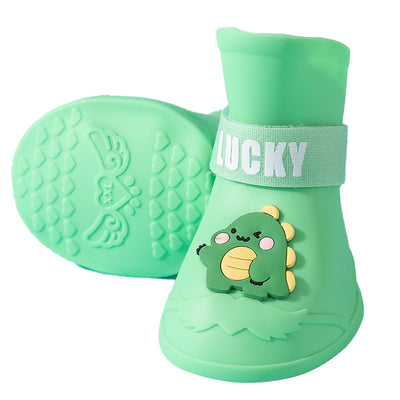 Four yellow silicone dog booties with a cartoon dog face emblem and "LUCKY" strap on a light blue background. - Image 5