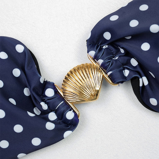 Woman in a navy blue polka dot tube top bikini and matching maxi skirt with side ties, posing outdoors. - Image 17