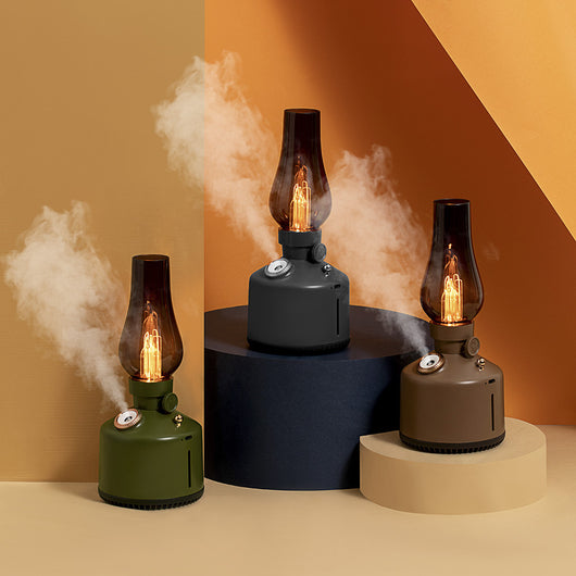 Wood grain kerosene lamp air humidifier with a clear glass-like top and a white light element, featuring a gold control knob. - Image 20